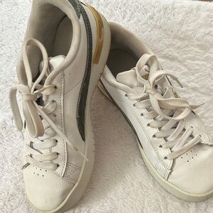 PUMA sneakers, with green denim accents.